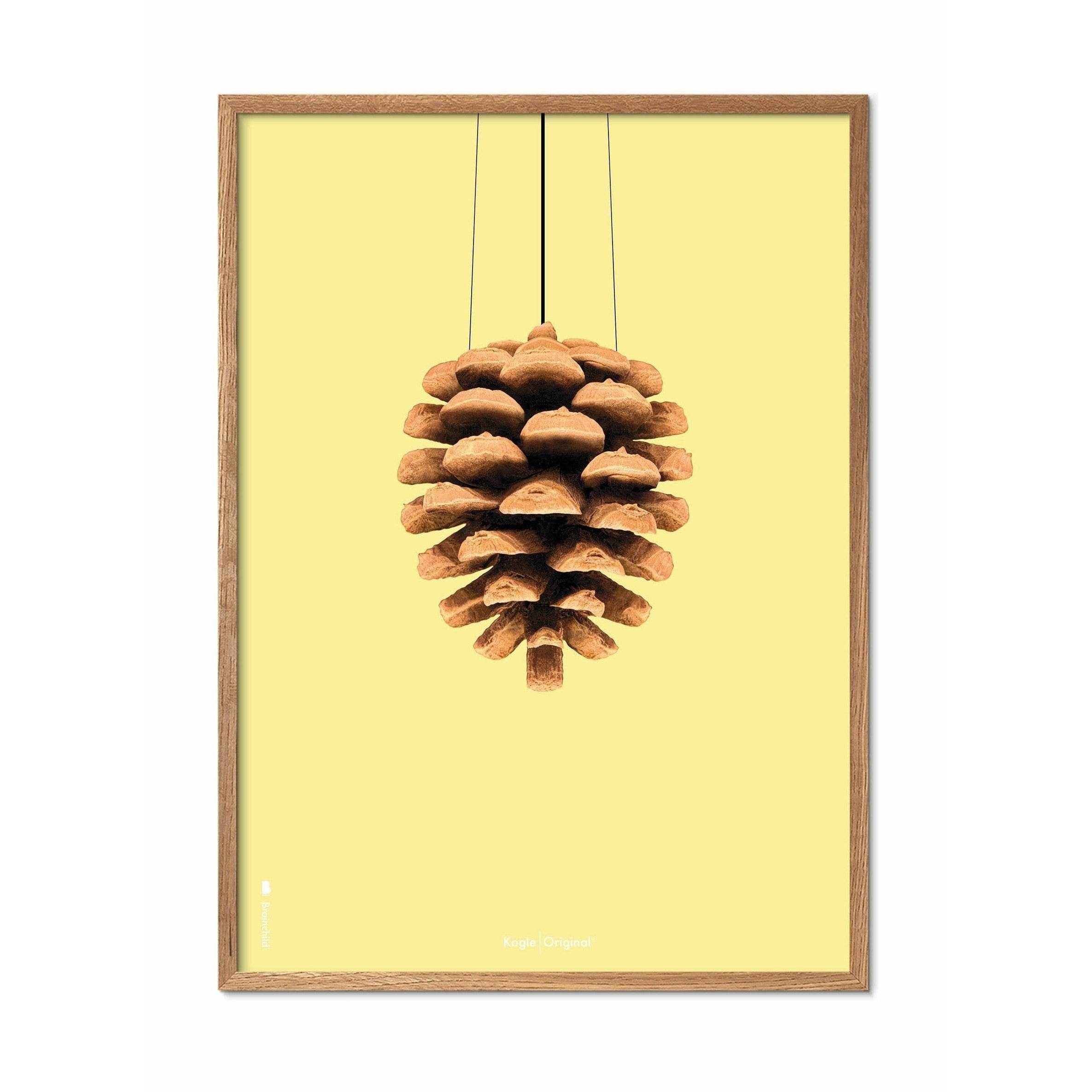Poster classico di cono di pino da un'idea, cornice in legno chiaro A5, sfondo giallo