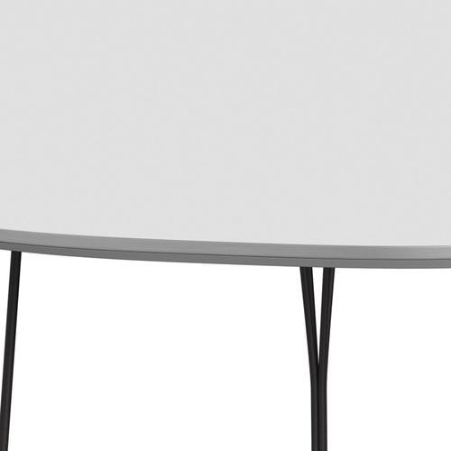 Fritz Hansen Superellipse Tavolo da pranzo di grafite calda/laminati bianchi Fenix, 240x120 cm